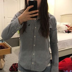 Blue and white plaid polo